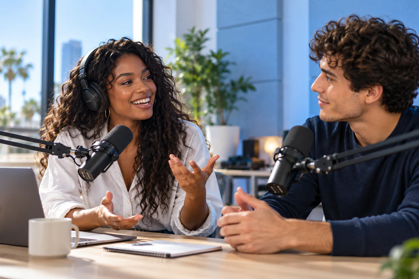Two creators recording a podcast conversation